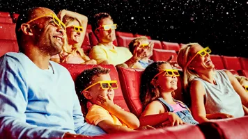 Adults and children in a 4D theater at LEGOLAND Discovery Center